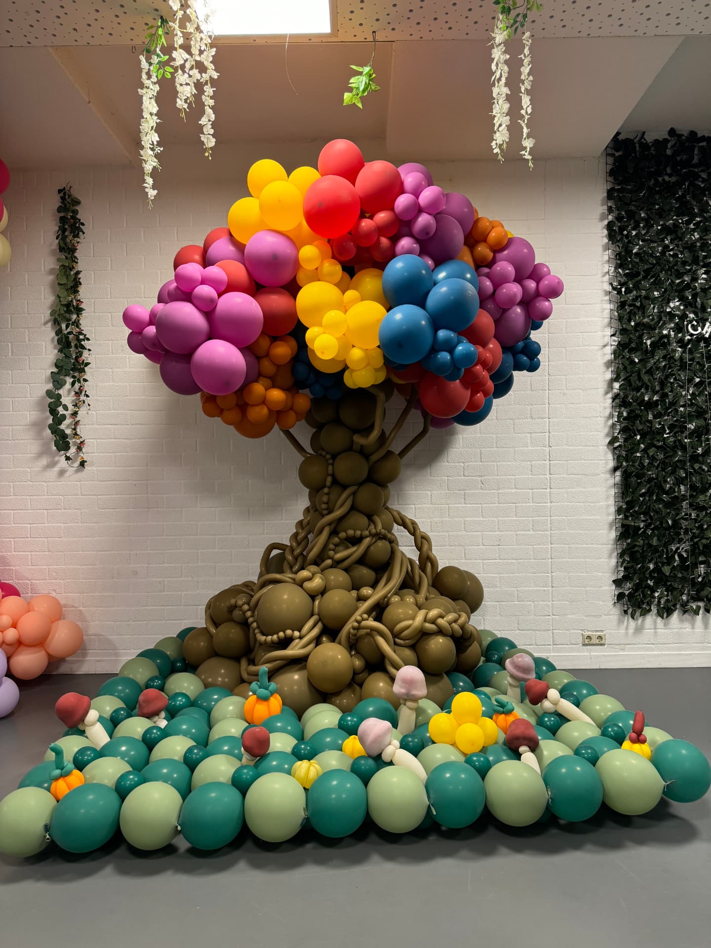 Large colorful balloon tree installation
